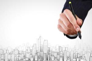 http://www.dreamstime.com/stock-image-construction-model-close-up-human-hand-drawing-project-image45265021
