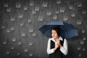http://www.dreamstime.com/stock-images-tax-fear-accountant-woman-has-worried-businesswoman-hide-under-umbrella-against-raining-image39333054