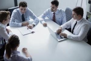 http://www.dreamstime.com/royalty-free-stock-photography-five-business-people-having-business-meeting-table-office-image33402917